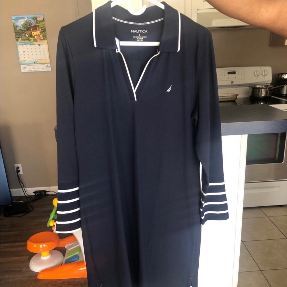 Nautica Dress
Red Dress with Black Detailing
Collared
New, Never Worn
With Tags